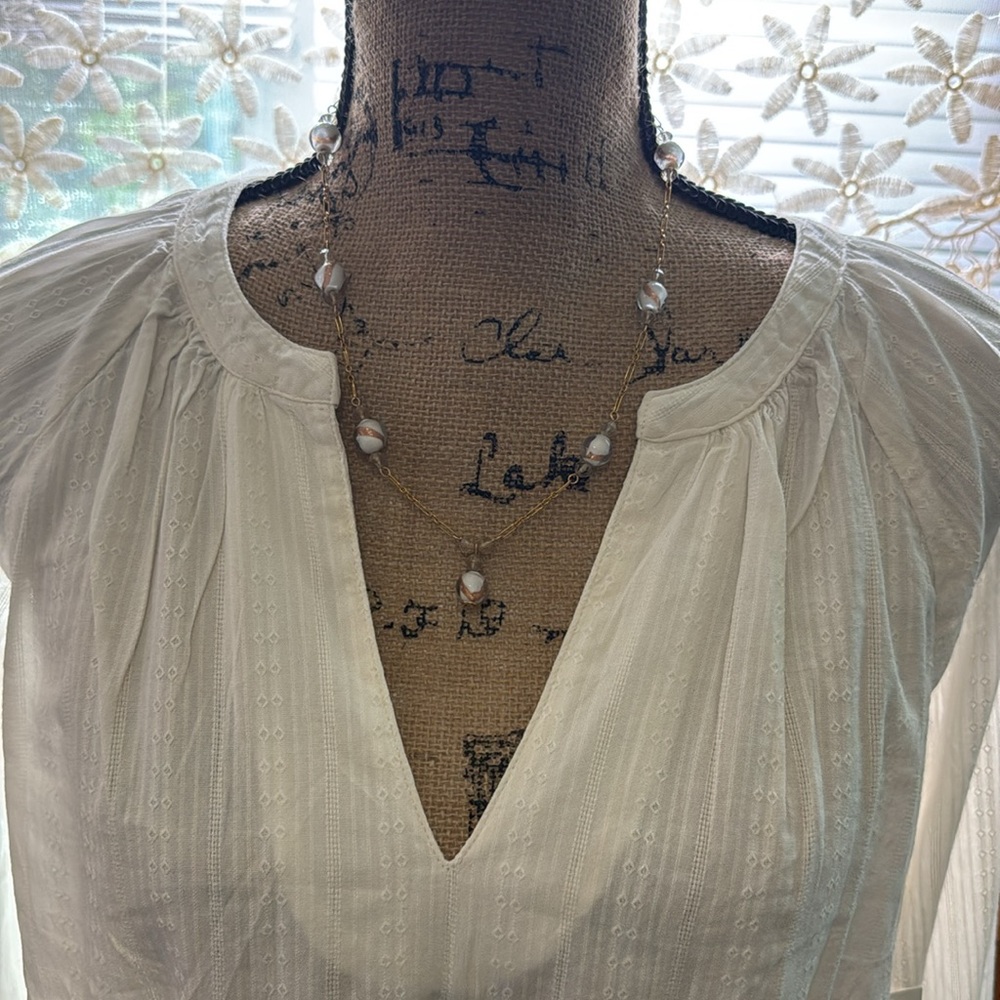 NWT Old Navy V-neck tunic top. Off white top with eyelet’s stitch throughout. M.